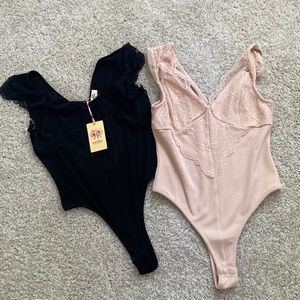 2 Bodysuits! Black & Nude Size Large
Great condition
Tags have been removed